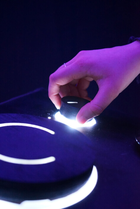 Hanami, interactive installation and immersive experience, hand focus on button